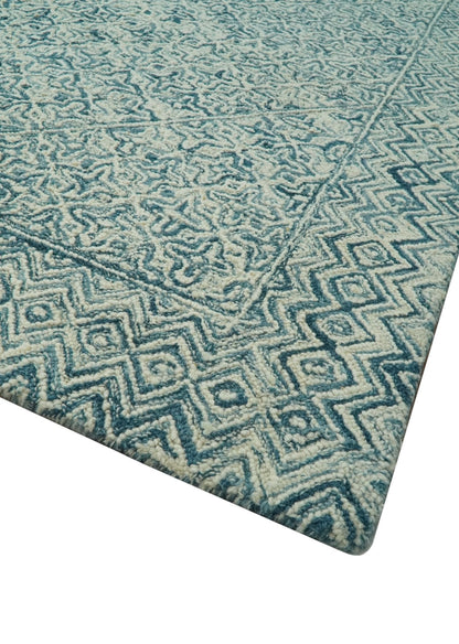 Modern Geometrical Teal and Ivory Hand Tufted Custom Made wool area rug.