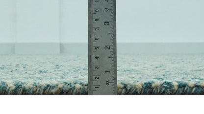 Modern Geometrical Teal and Ivory Hand Tufted Custom Made wool area rug.