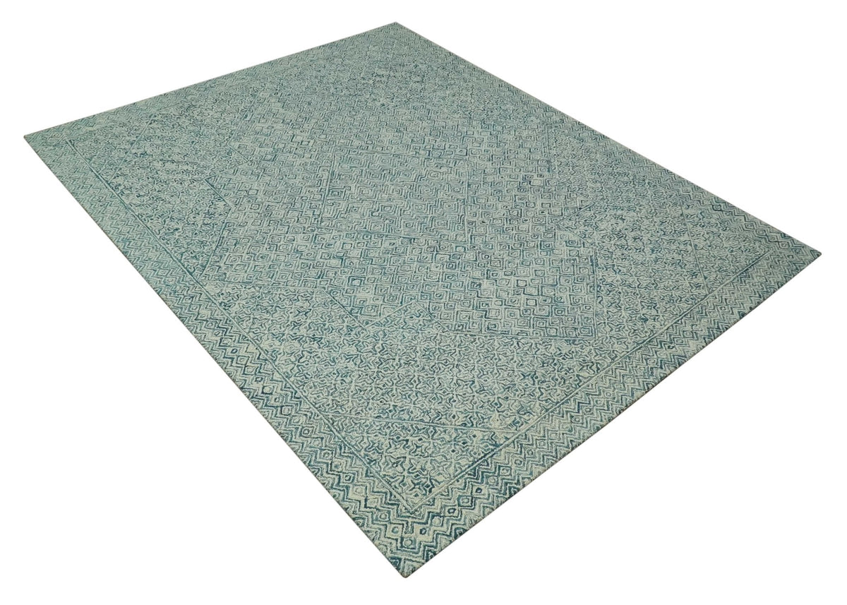 Modern Geometrical Teal and Ivory Hand Tufted Custom Made wool area rug.