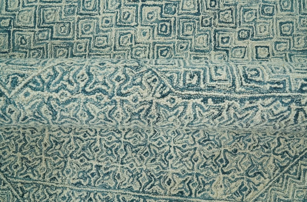 Modern Geometrical Teal and Ivory Hand Tufted Custom Made wool area rug.
