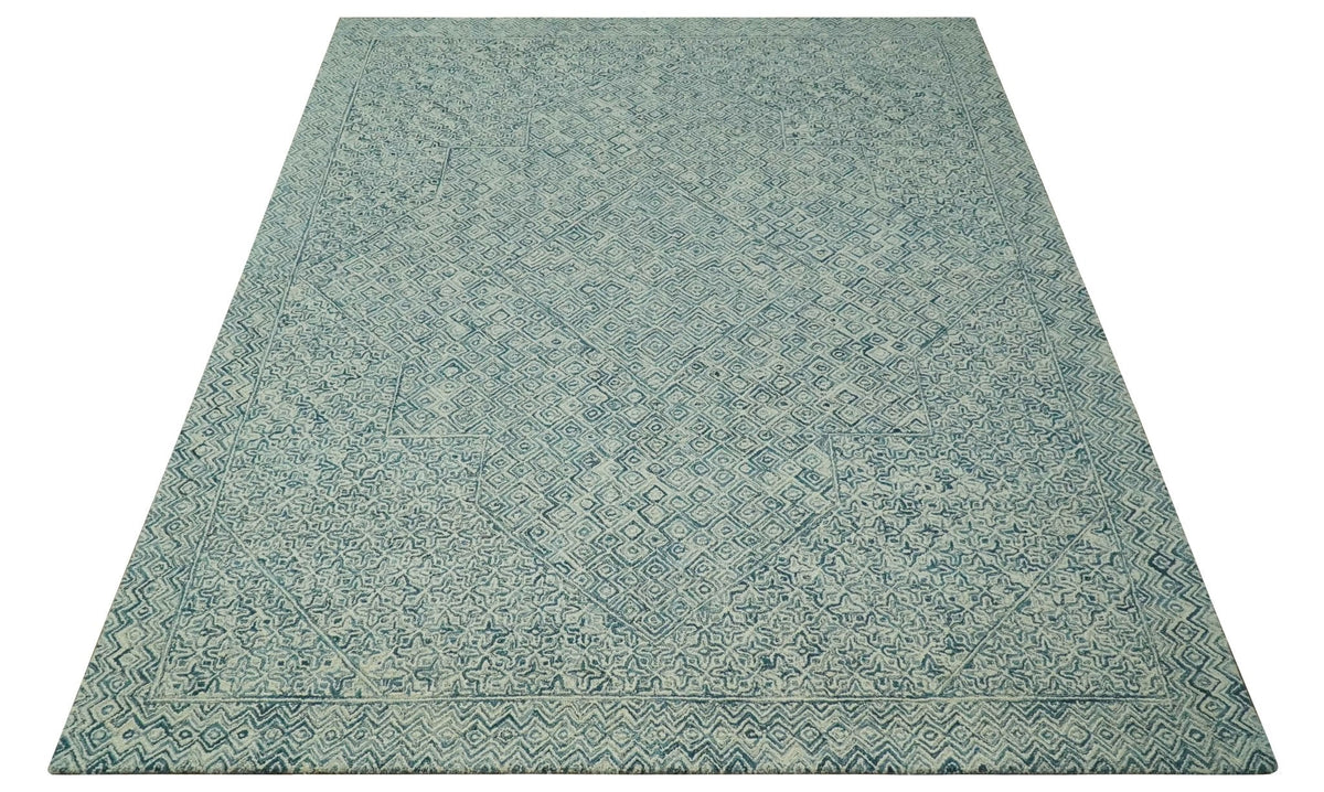 Modern Geometrical Teal and Ivory Hand Tufted Custom Made wool area rug.