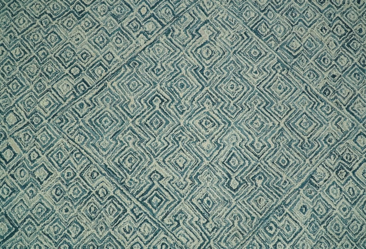 Modern Geometrical Teal and Ivory Hand Tufted Custom Made wool area rug.