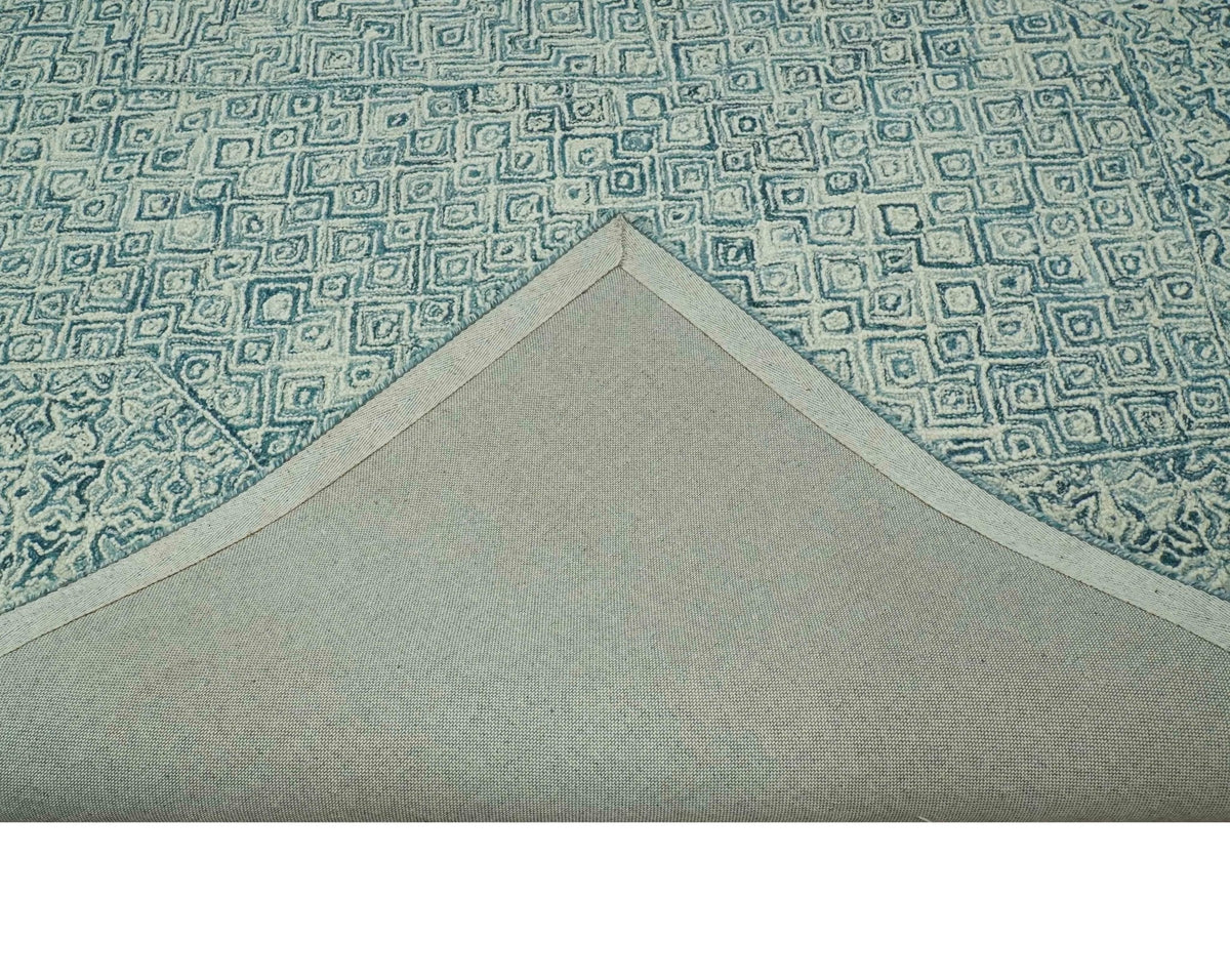 Modern Geometrical Teal and Ivory Hand Tufted Custom Made wool area rug.