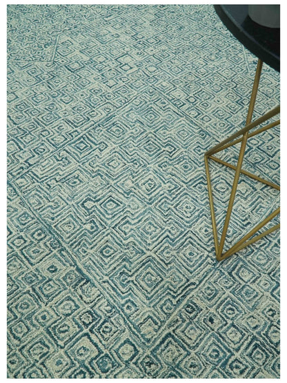 Modern Geometrical Teal and Ivory Hand Tufted Custom Made wool area rug.