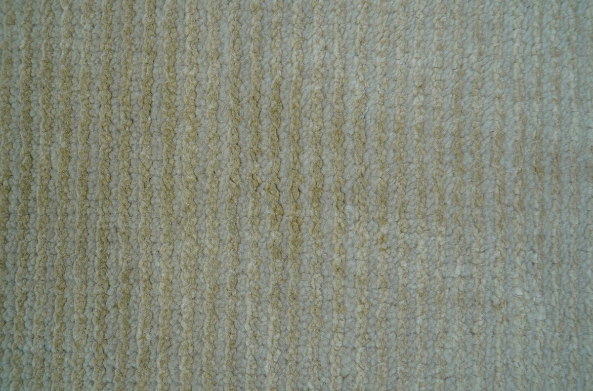 Modern Solid Design Beige Hand Knotted Wool And Silk Rug.