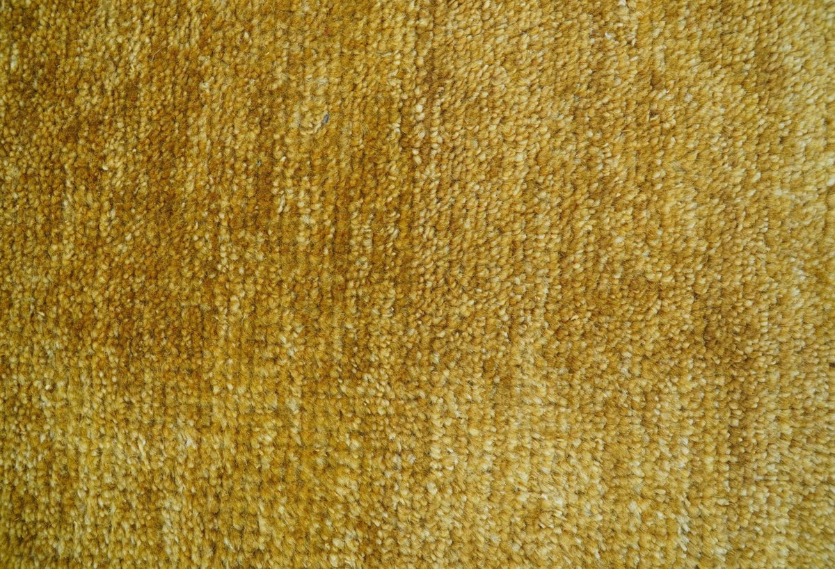 Modern Solid Design Gold Hand Knotted Wool Area Rug.