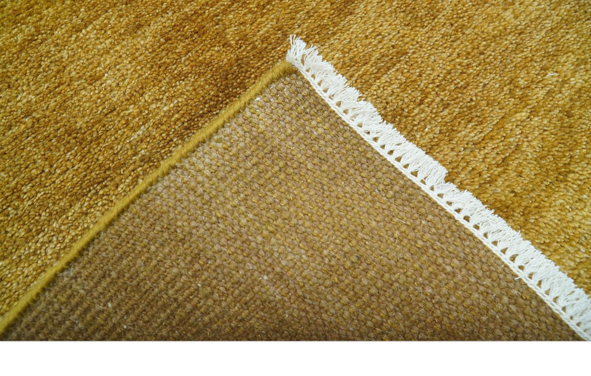 Modern Solid Design Gold Hand Knotted Wool Area Rug.