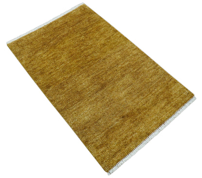 Modern Solid Design Gold Hand Knotted Wool Area Rug.