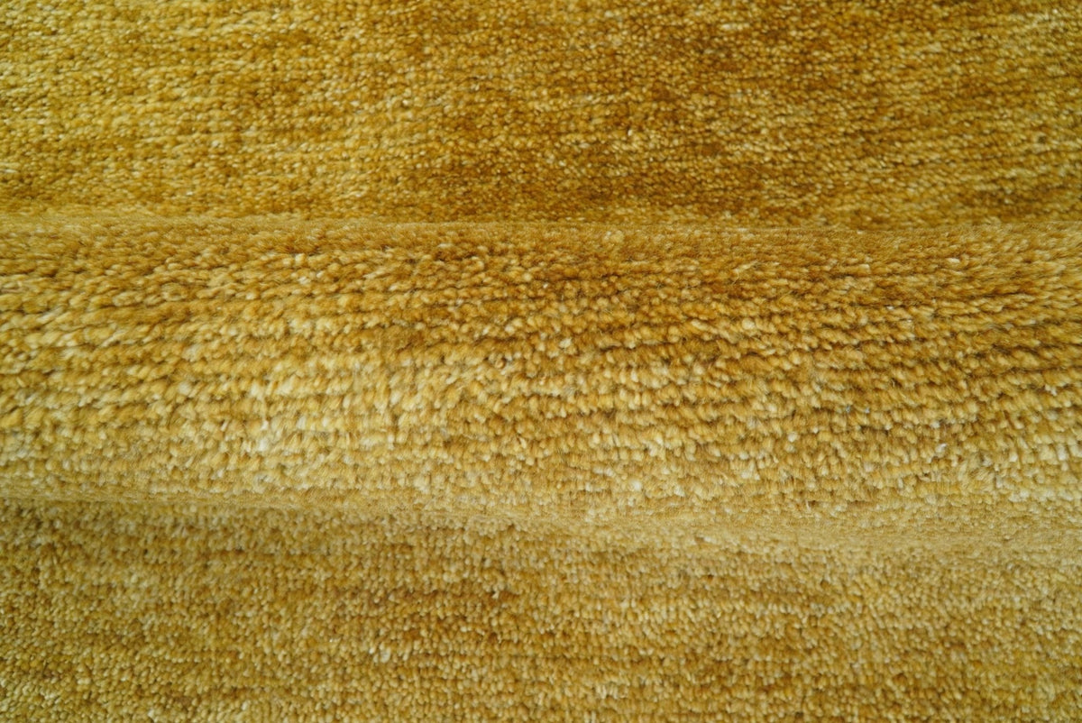 Modern Solid Design Gold Hand Knotted Wool Area Rug.