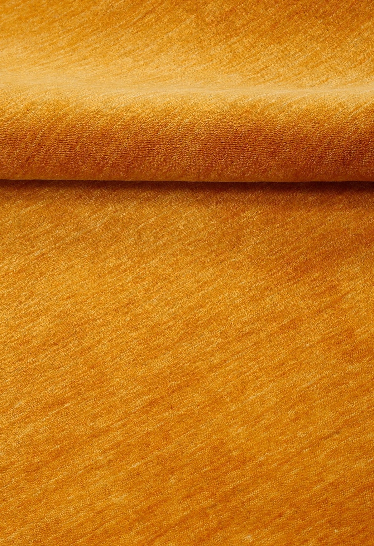 Modern Solid Gold Hand Loomed Wool Area Rug.