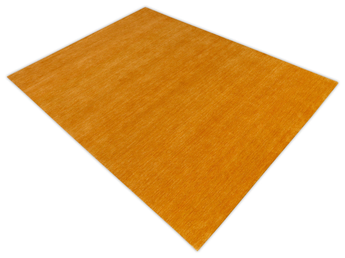 Modern Solid Gold Hand Loomed Wool Area Rug.