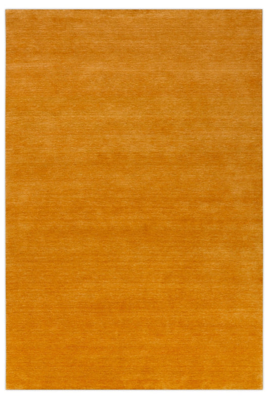 Modern Solid Gold Hand Loomed Wool Area Rug.