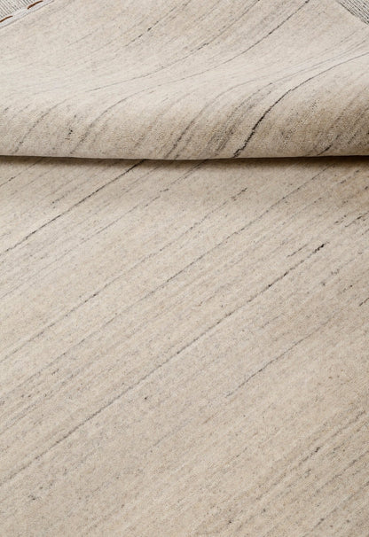 Modern Style Ivory Hand Loomed Wool Area Rug.