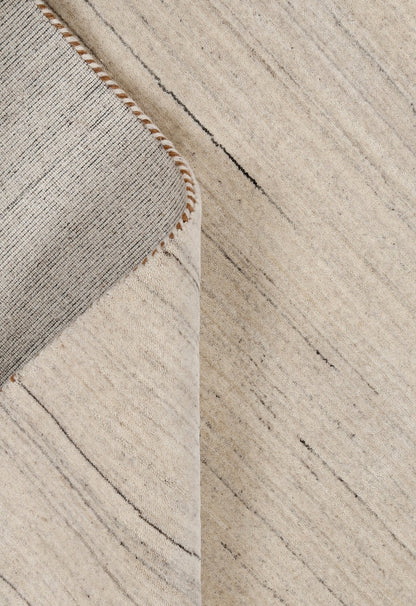 Modern Style Ivory Hand Loomed Wool Area Rug.