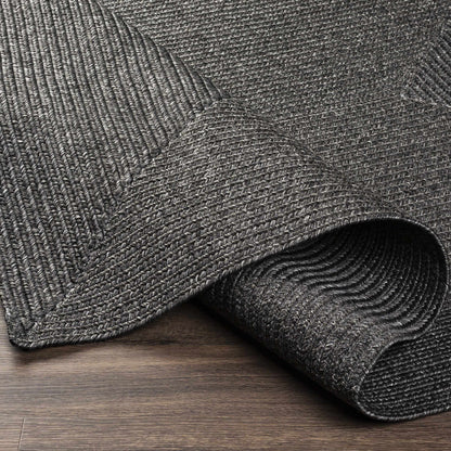 Black Braided Faux Jute Outdoor Rug.