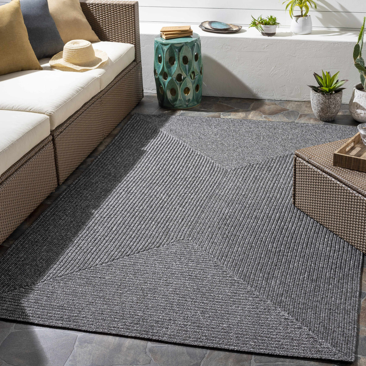 Black Braided Faux Jute Outdoor Rug.