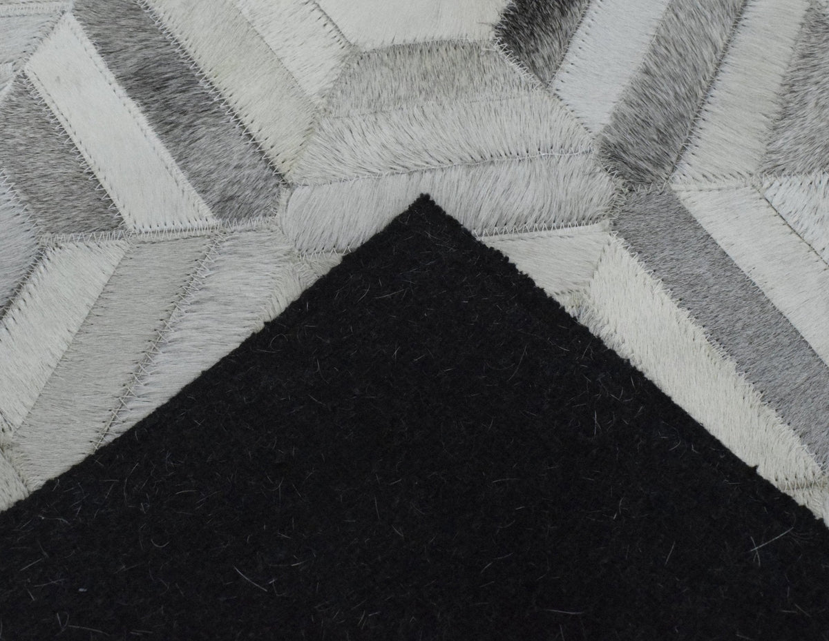Modern Handmade Ivory and Silver Genuine Leather Area Rug.
