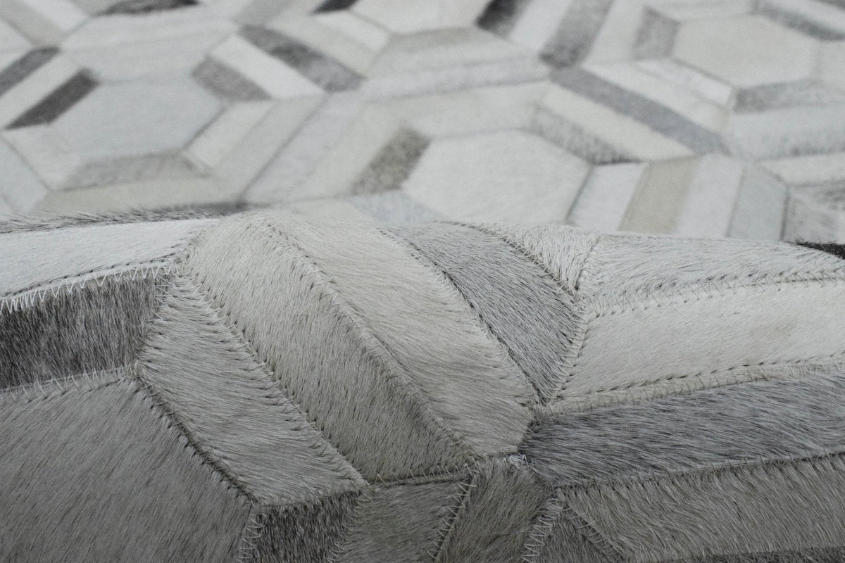 Modern Handmade Ivory and Silver Genuine Leather Area Rug.