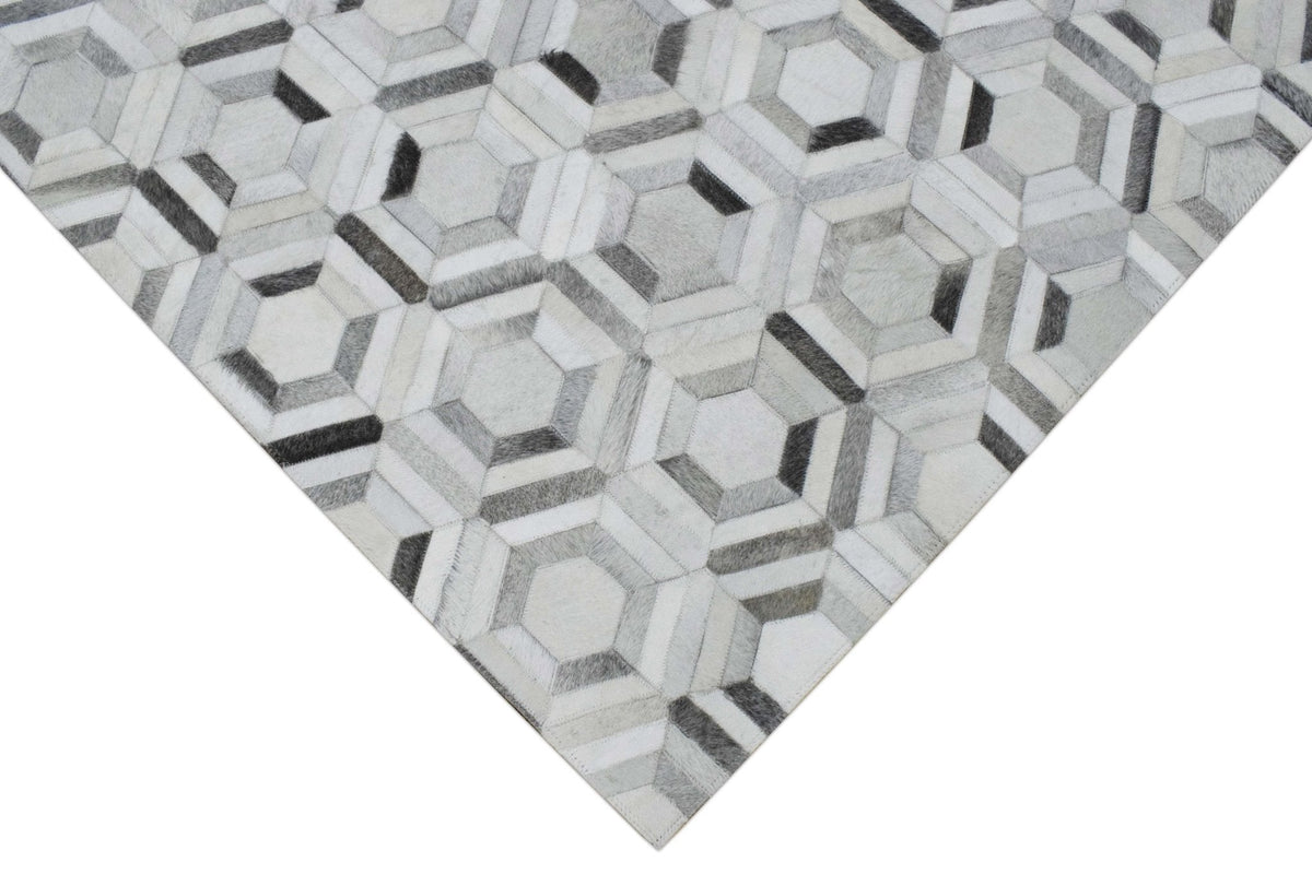Modern Handmade Ivory and Silver Genuine Leather Area Rug.