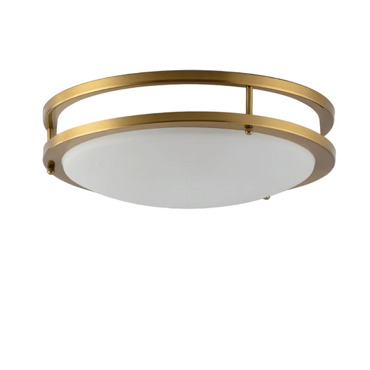 Ceiling light fixture with gold frame and white glass on a plain background