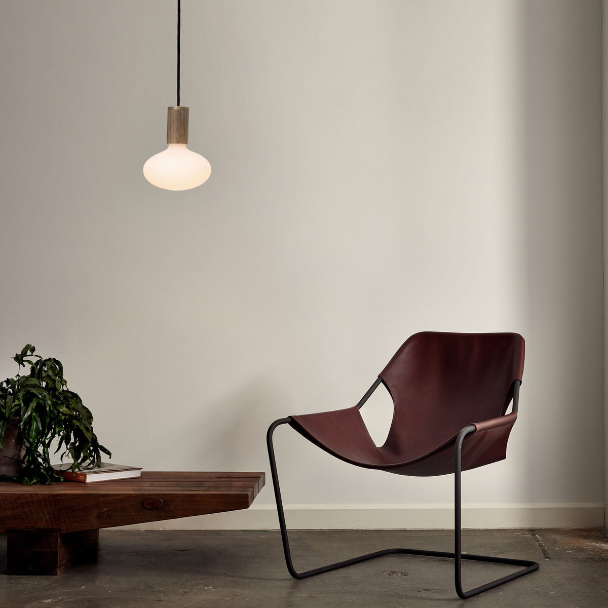 Oval Pendant Light in Walnut.