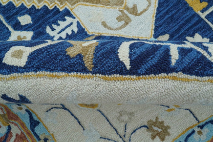 Ollie Traditional Blue And Ivory Hand Tufted Wool Rug.