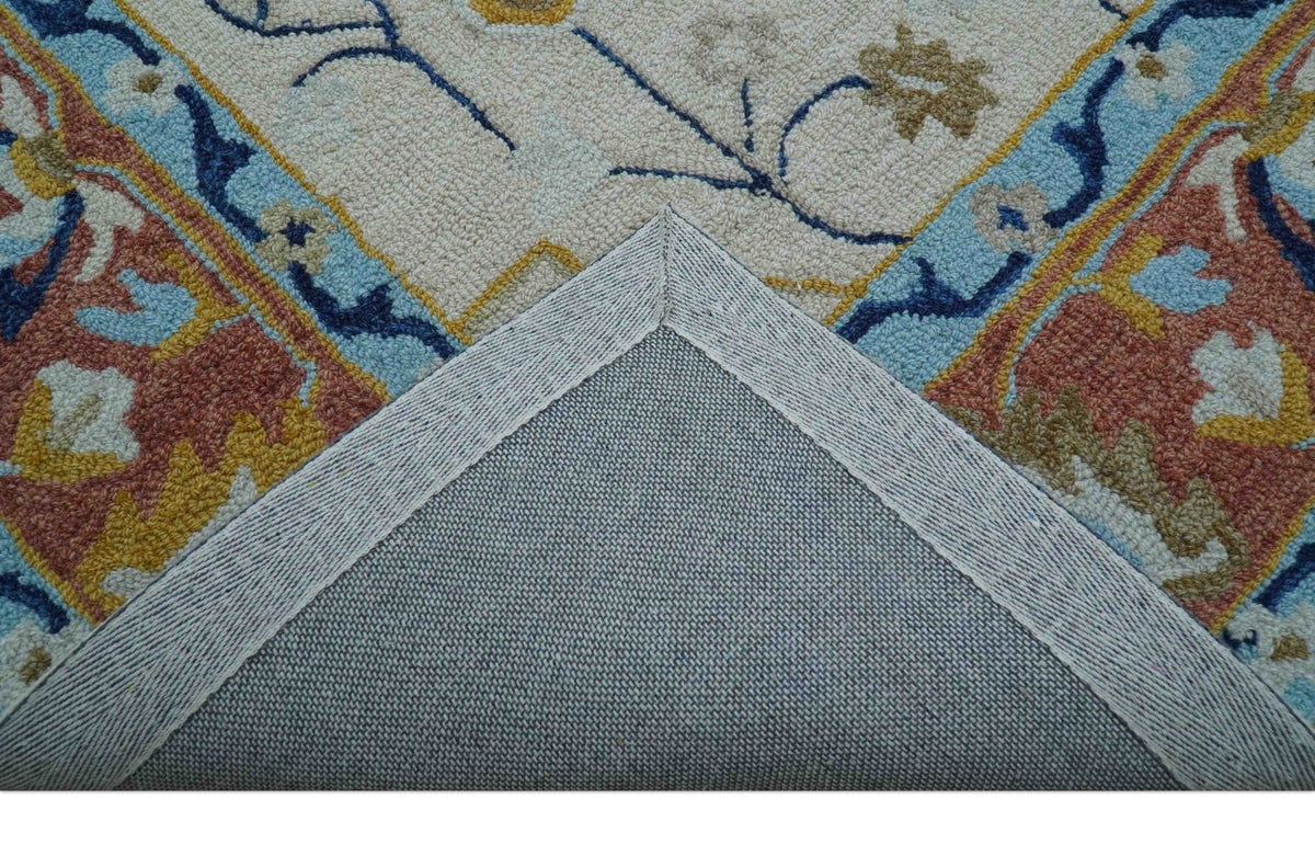 Ollie Traditional Blue And Ivory Hand Tufted Wool Rug.