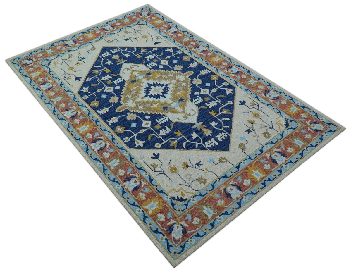 Ollie Traditional Blue And Ivory Hand Tufted Wool Rug.