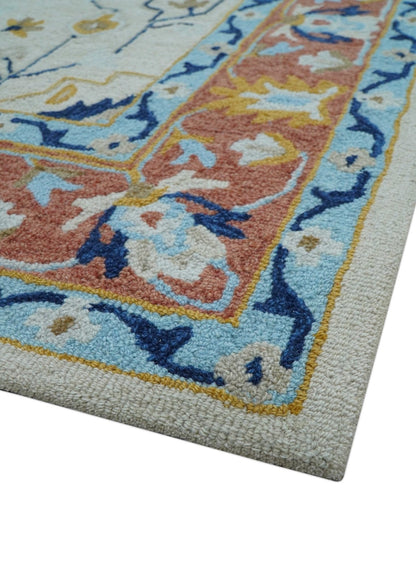 Ollie Traditional Blue And Ivory Hand Tufted Wool Rug.