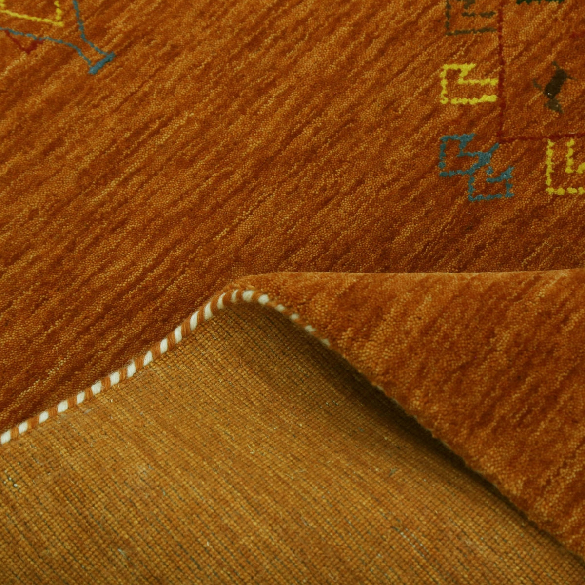 Orange Center Pattern Hand Loomed Wool Area Rug.