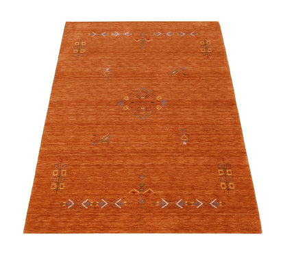 Orange Center Pattern Hand Loomed Wool Area Rug.