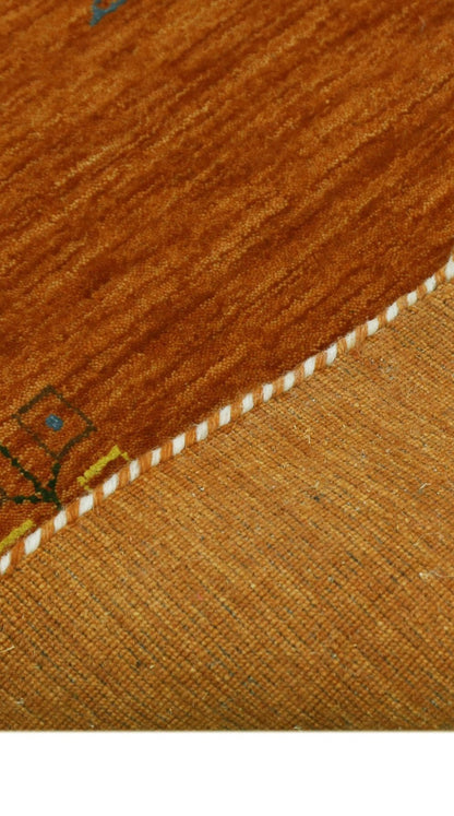 Orange Center Pattern Hand Loomed Wool Area Rug.