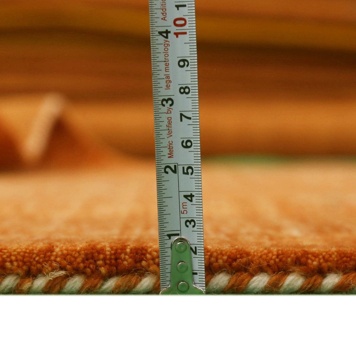 Orange Center Pattern Hand Loomed Wool Area Rug.