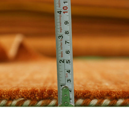 Orange Center Pattern Hand Loomed Wool Area Rug.