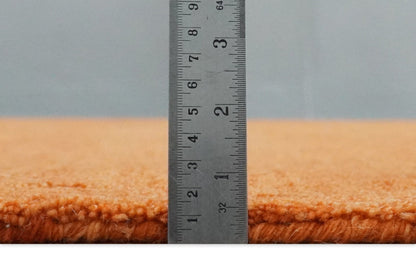 Custom Made orange Solid Woolen Hand Tufted contemporary area Rug.