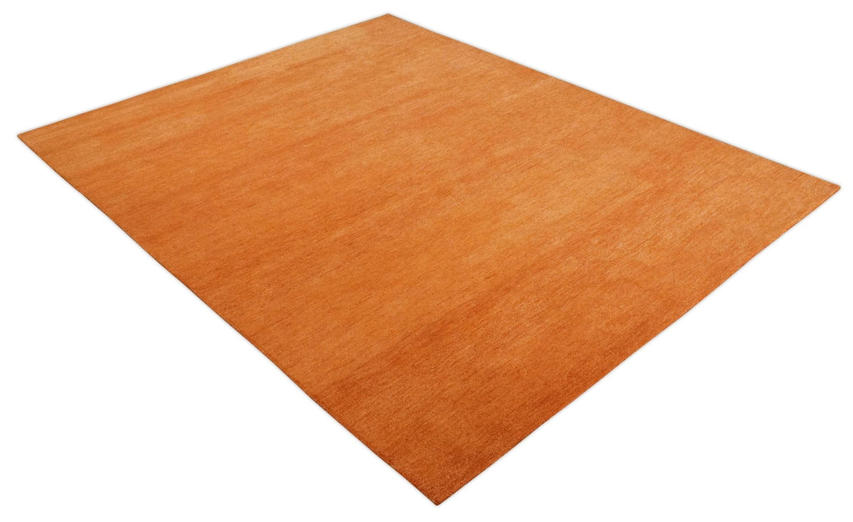 Custom Made orange Solid Woolen Hand Tufted contemporary area Rug.
