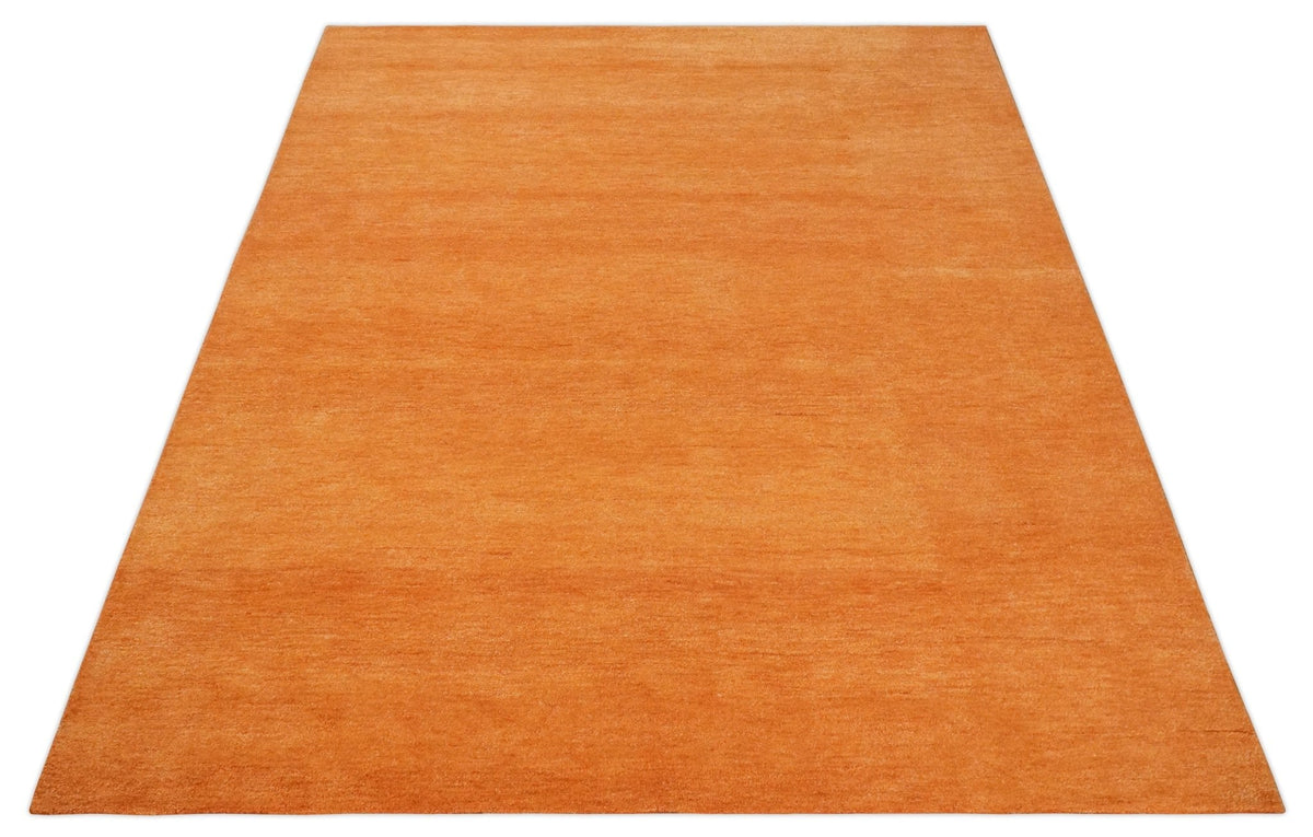 Custom Made orange Solid Woolen Hand Tufted contemporary area Rug.