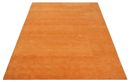 Custom Made orange Solid Woolen Hand Tufted contemporary area Rug.