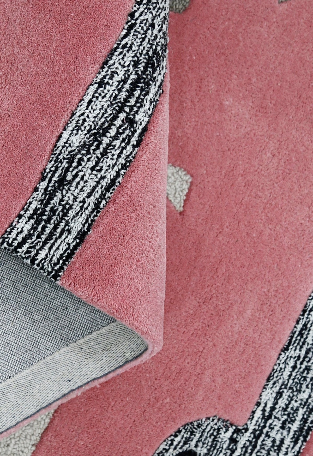 Pink Stretchy Pup Hand Tufted 3x6 Wool Area Rug.