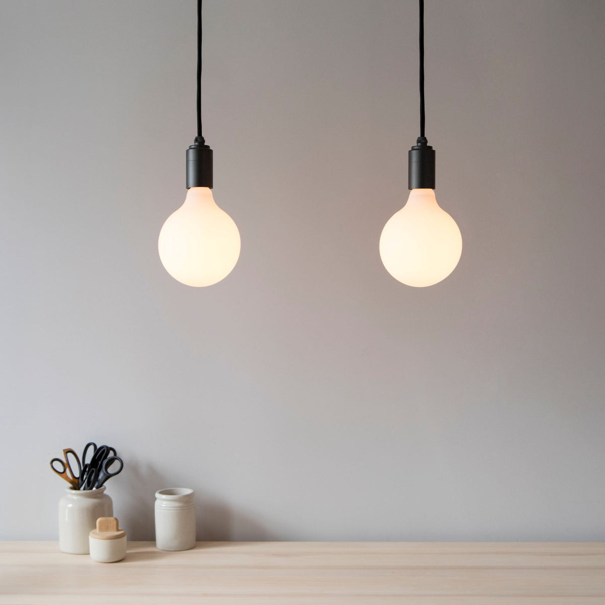 Porcelain III Pendant Light in Walnut.