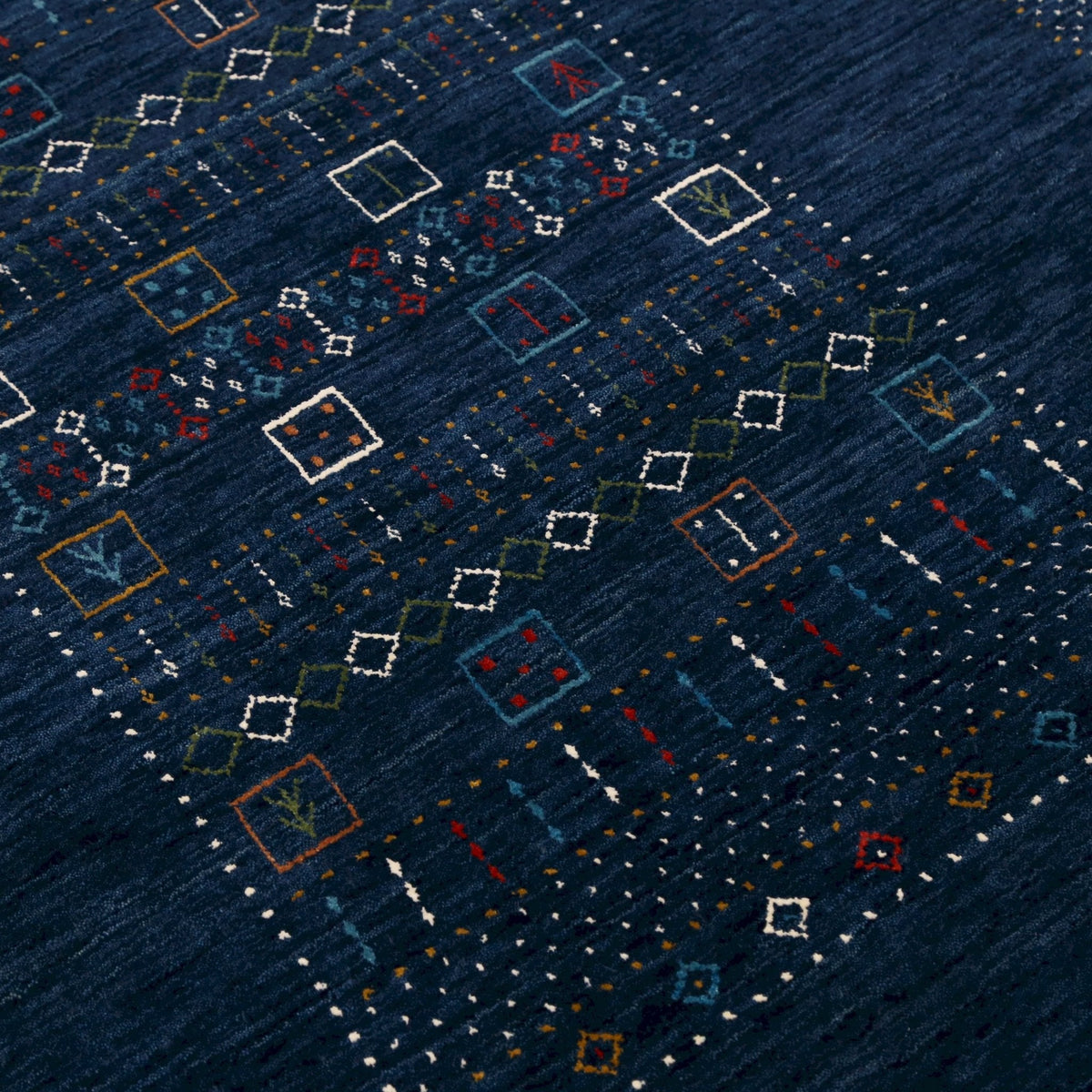 Blue Center Pattern Hand Loomed Wool Area Rug.