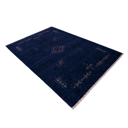 Blue Tribal Center Medallion Hand Loomed Wool Area Rug.