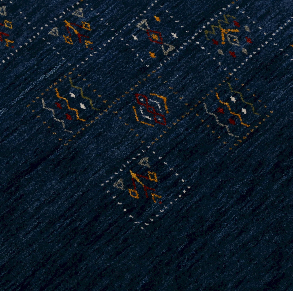 Blue Tribal Design Hand Loomed Wool Area Rug.
