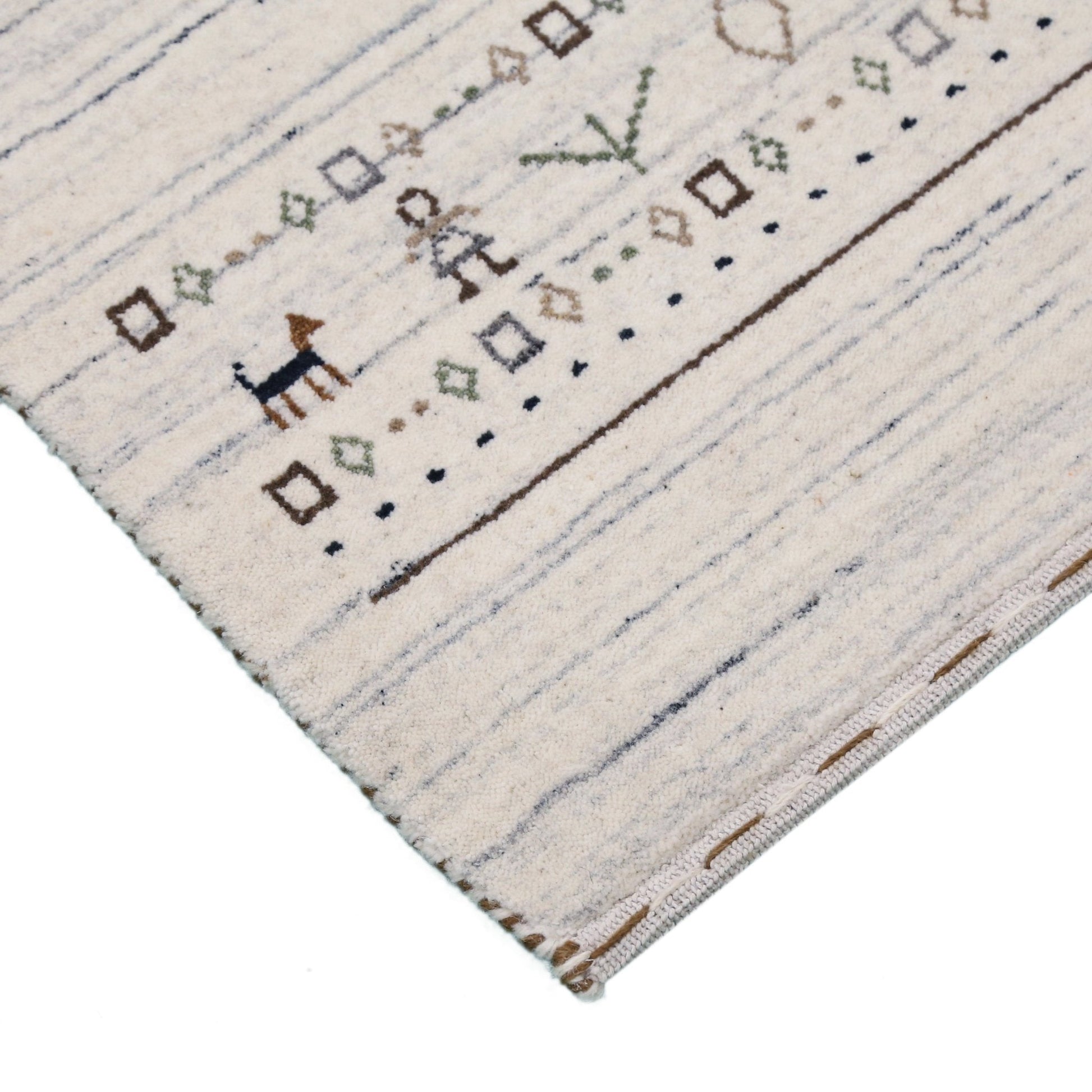 Contemporary Ivory Design Hand Loomed Wool Rug.