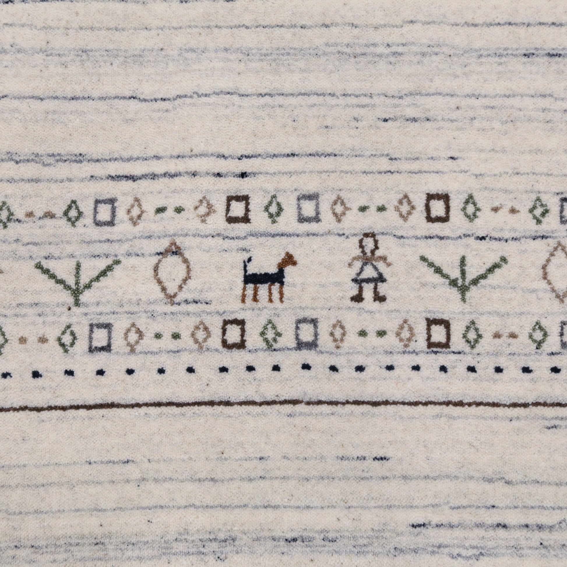 Contemporary Ivory Design Hand Loomed Wool Rug.