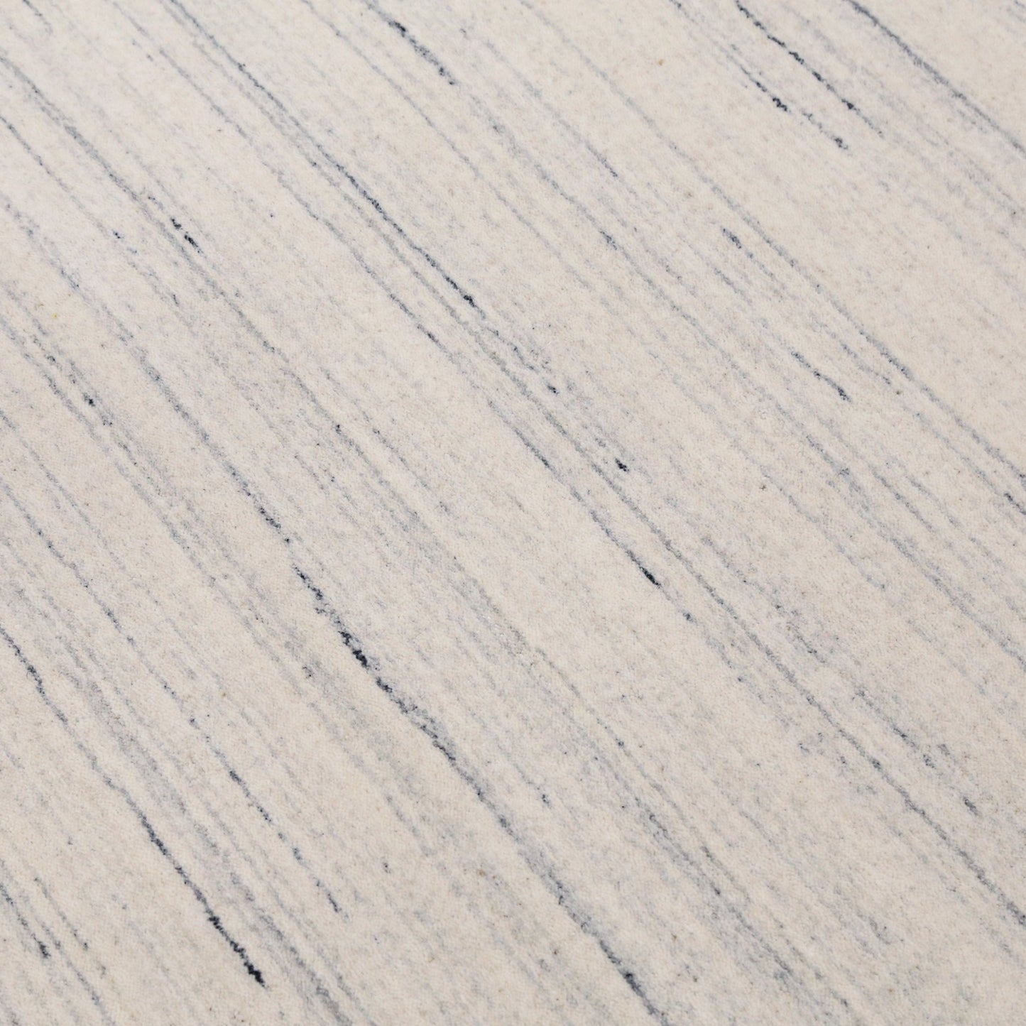 Contemporary Ivory Design Hand Loomed Wool Rug.