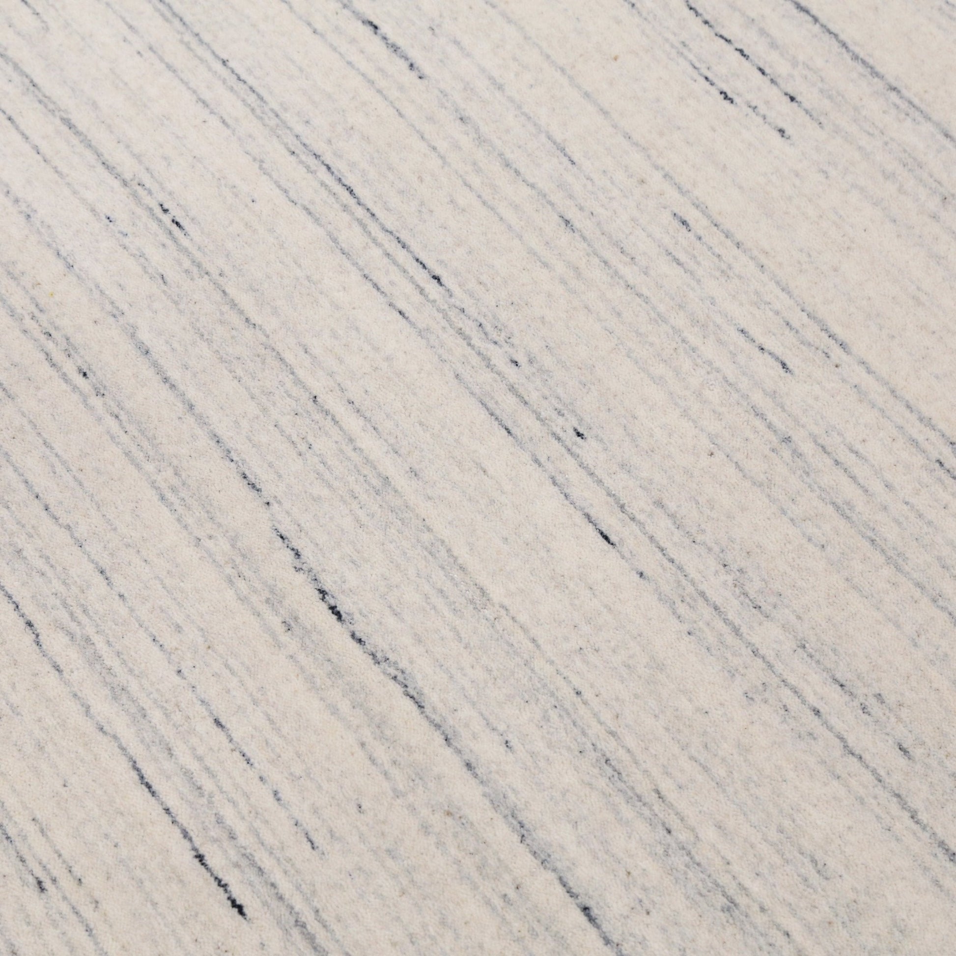 Contemporary Ivory Design Hand Loomed Wool Rug.
