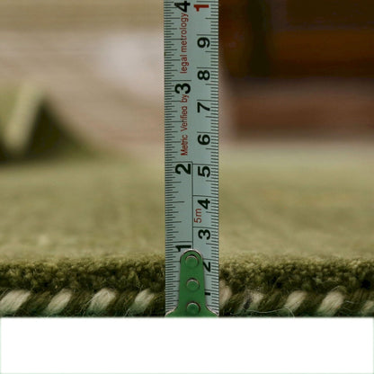 Green Tribal Center Medallion Hand Loomed Wool Area Rug.