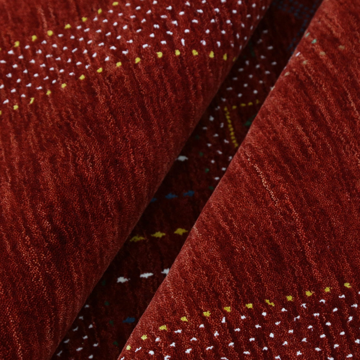 Red Center Pattern Hand Loomed Wool Area Rug.