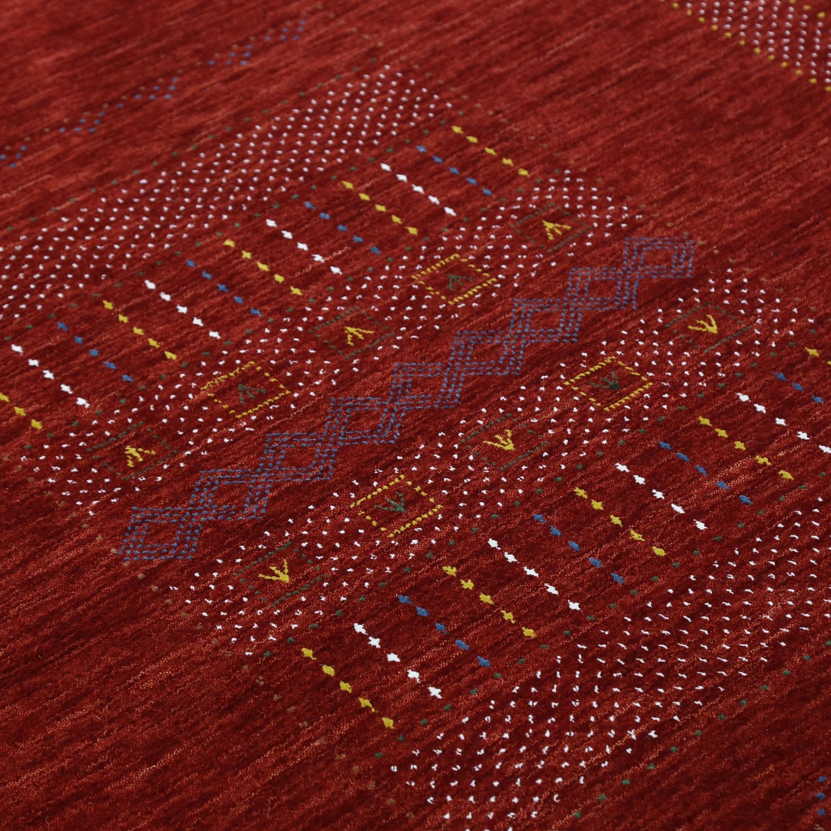 Red Center Pattern Hand Loomed Wool Area Rug.